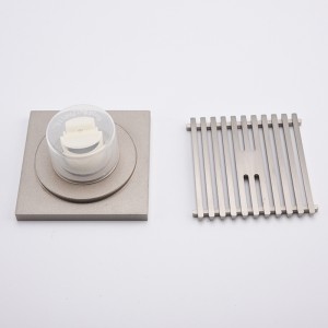 Înveliți capacele de scurgere ale podelei din garaj