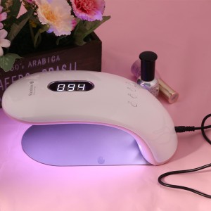 Femeia poate ține jumătate din lampa de terapie ușoară Sky Rainbow 2